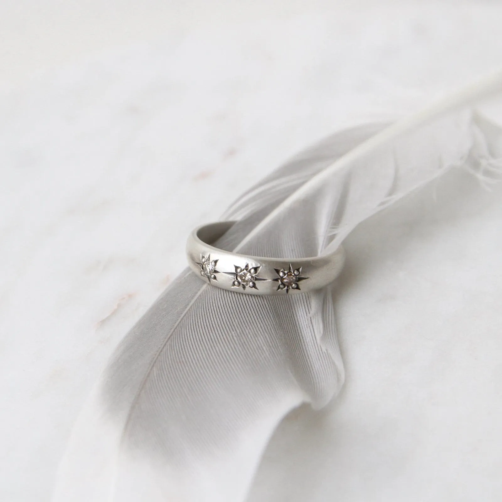 Three Star Set Diamond Band in Sterling Silver
