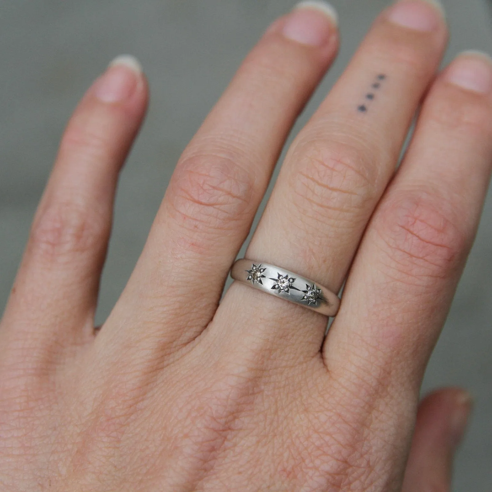 Three Star Set Diamond Band in Sterling Silver
